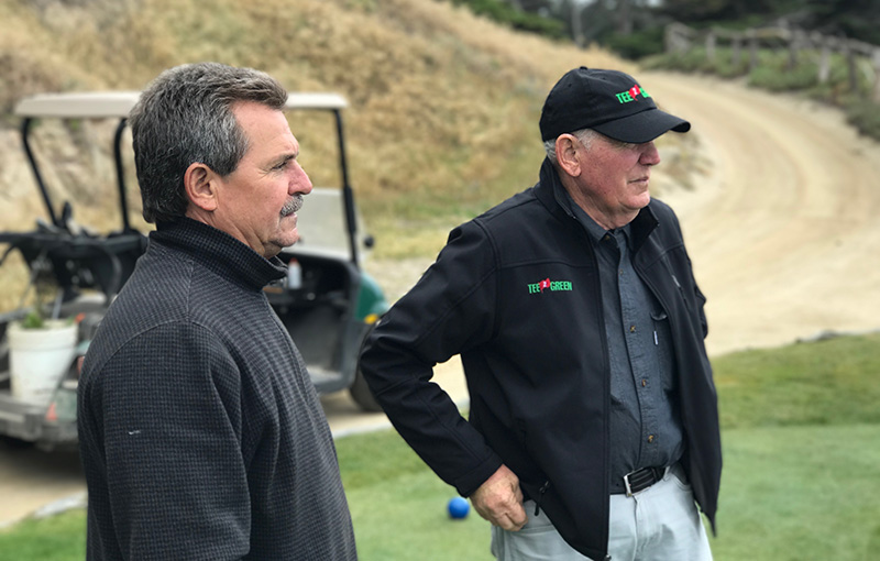 Close up image of Jeff Markow, CGCS and Terry Plagmann standing outside at Cypress Point Golf Club