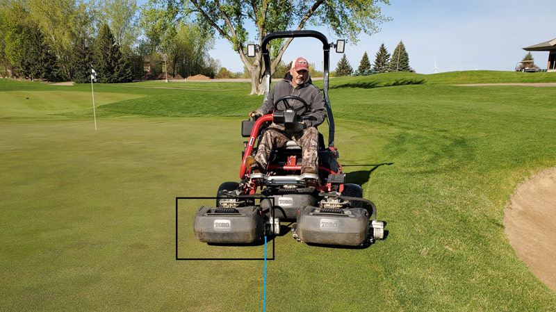 Mowing golf course collar