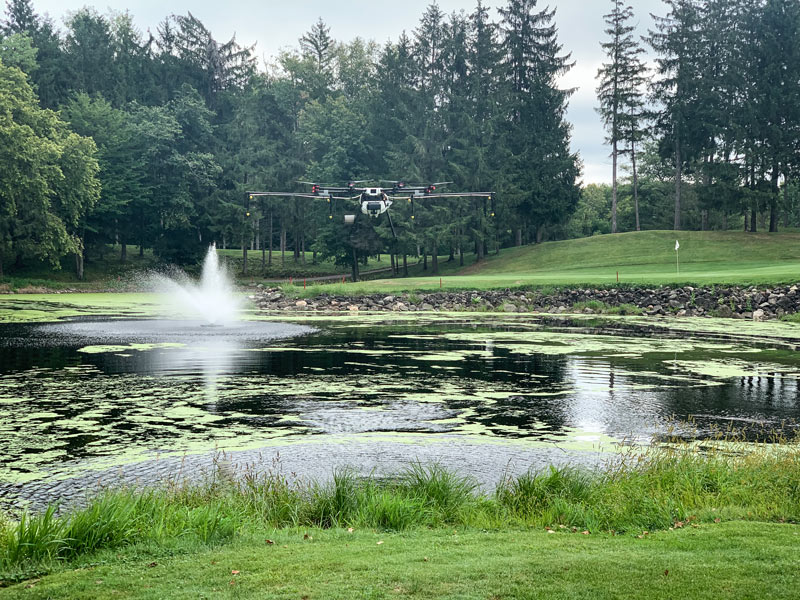 Drone spraying pond