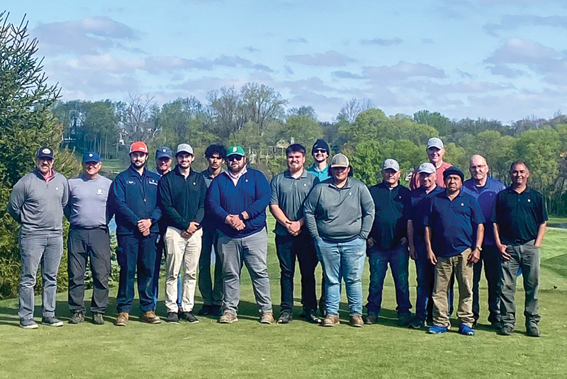 Crew of The Club at Chatham Hills on the golf course