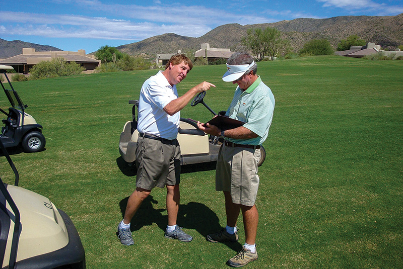 Shawn Emerson standing outside on a golf course