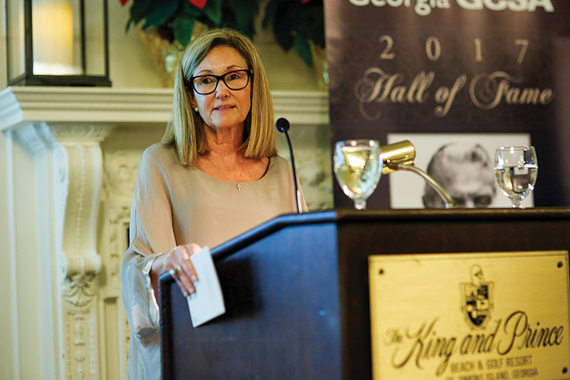 Tenia Workman speaking at a Georgia GCSA event