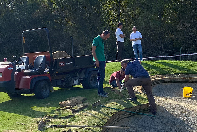 crew of people building out a bunker