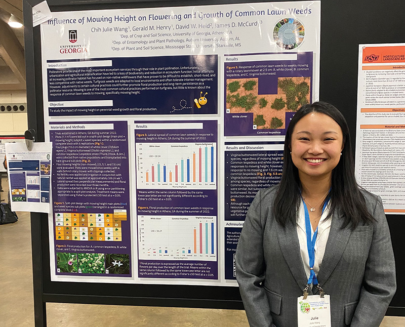 Julie Wang with poster on research study