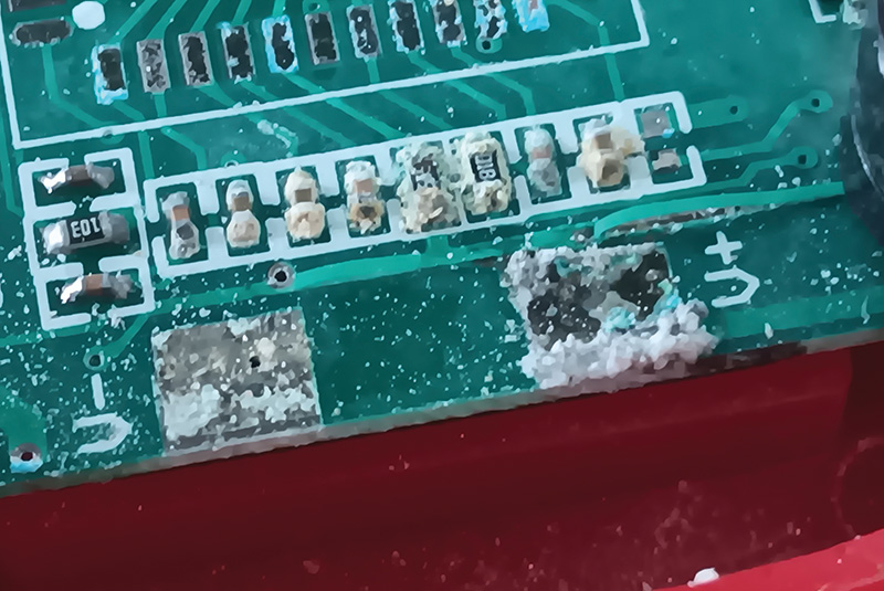 A pair of leaking alkaline batteries